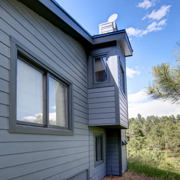 Morrison Transformation | Full Siding Replacement | Stone Accent