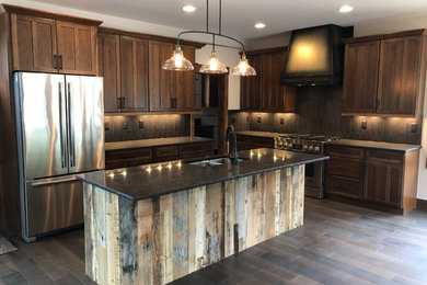 Mountain style kitchen photo in Denver