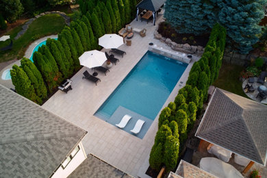 Interlocking Backyard Makeover with Custom Pool & Stonework Burlington, Ontario