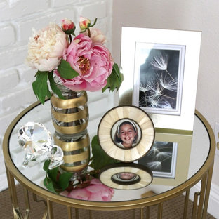 Mid-sized contemporary home office in Orange County with beige walls, carpet, a standard fireplace, a brick fireplace surround, a freestanding desk and beige floor.