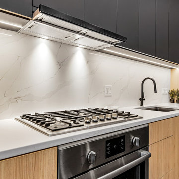 Sophisticated matte black and warm rift cut oak collision