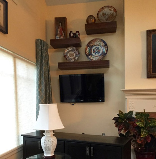 High wall space above a mounted TV...