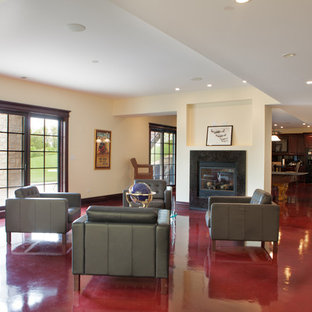 Design ideas for a large classic walk-out basement in Chicago with beige walls, lino flooring, a two-sided fireplace, a tiled fireplace surround and red floors.