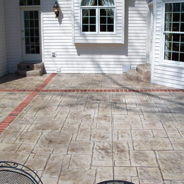 Town and Country, Missouri stamped concrete back patio with brick banding