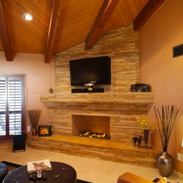 Ledger Stone Fireplace by Idola Design Group