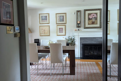 Example of a minimalist dining room design in Montreal