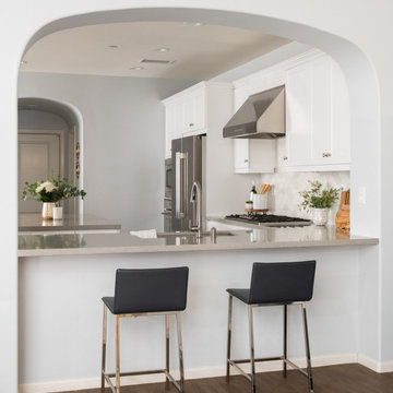 Beautiful Arch and Peninsula Seating in Kitchen Remodel