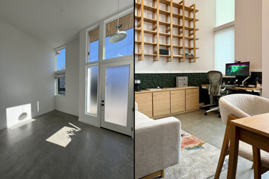 Example of a small minimalist freestanding desk concrete floor, gray floor and wall paneling home studio design in Seattle with pink walls
