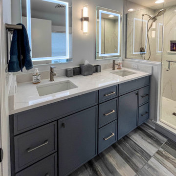 Primary Suite Remodel with Blue Cabinetry and Calacatta Miraggio Duo Quartz