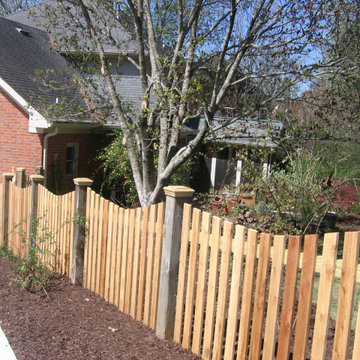 Tate SInkhole Repair next to House & Garage
