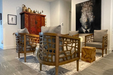 Inspiration for a small transitional open concept porcelain tile and gray floor living room remodel in Other with white walls