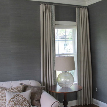 Neutral Drapery Panels with Greek Key leading edge detail.