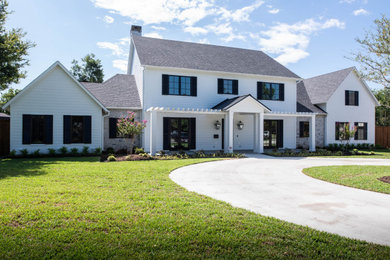 Large transitional white one-story concrete fiberboard exterior home photo in Dallas with a shingle roof and a gray roof