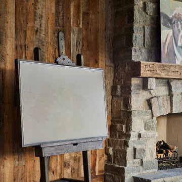 Hand Hewn Timber Mantel and Weathered Antique Paneling in Farmhouse Living Room