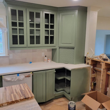 Custom Sage Green Corner Cabinet Design with Lazy Susan & Appliance Garage