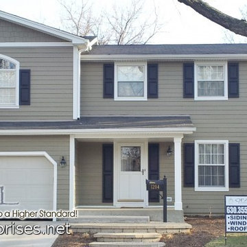 Exterior Remodel with Woodstock Brown Hardie Siding, GAF Roof & Alside Gutters