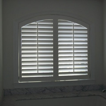 White Wood Shutters in Condo.