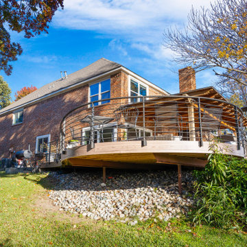 Elevated Curved Deck with Roof Extension Arbor