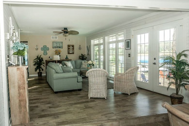 Design ideas for a beach style living room in Milwaukee.