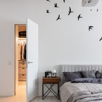 Белая мансардная квартира в историческом центре Петербурга