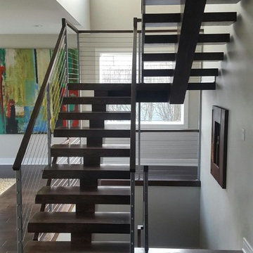 Open riser stairs with stainless steel cable wire railing