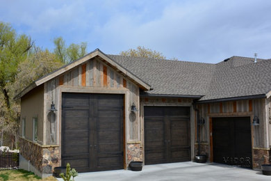 Barnwood Home with Steel Carriage House Garage Doors