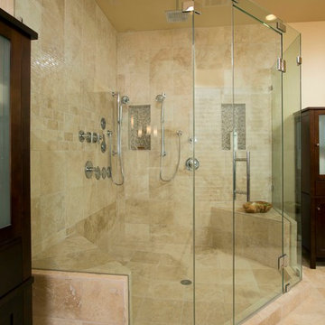 Use of Glass, Light and Fixtures Sets Leesburg Master Bathroom Apart