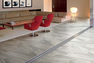 Living room - mid-sized modern formal and open concept porcelain tile living room idea in Chicago with beige walls