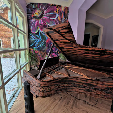 Statement Great Room with Sculptural Beams, Custom Furnishings, and Artful Finis
