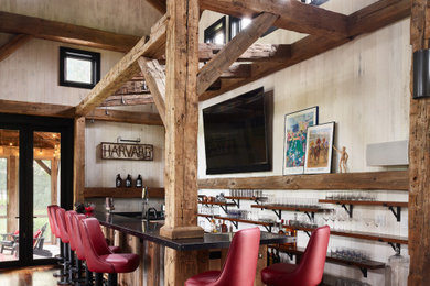 Wet bar - mid-sized rustic l-shaped dark wood floor and brown floor wet bar idea in Boston