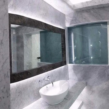 Carrara marble bathroom by ADL Tile and Stone