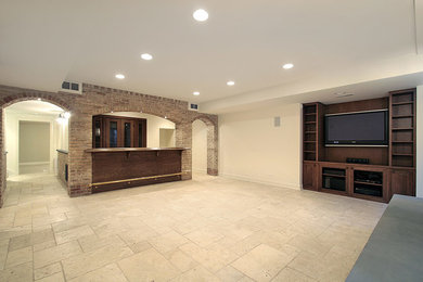 This is an example of a mid-sized transitional fully buried basement in Detroit with beige walls, travertine floors, no fireplace and beige floor.