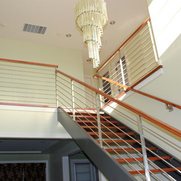 Contemporary stainless steel interior stair and guard railing