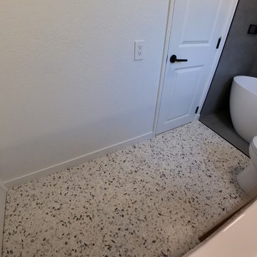 Ultra-Modern Smart Bathroom with Terrazzo Floor & Oval Soaking Tub