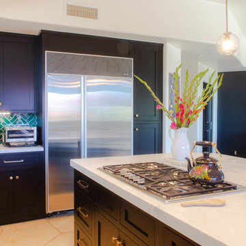 Black kitchen cabinets and kitchen island