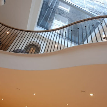 Oak handrail on a stone staircase