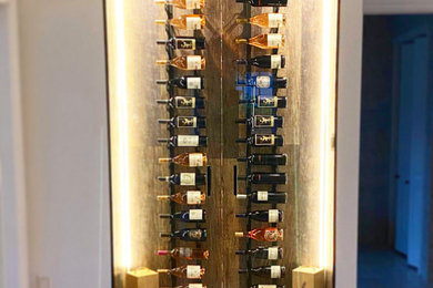 Inspiration for a contemporary wine cellar remodel in Miami