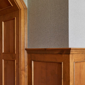 Fabric Covered Walls and Knotty Alder Wainscot
