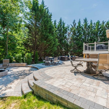 Outdoor fire-pit, seated walls, and large patio space for parties