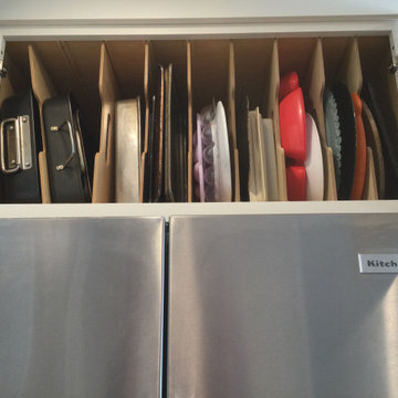 Tray dividers in refrig cabinet