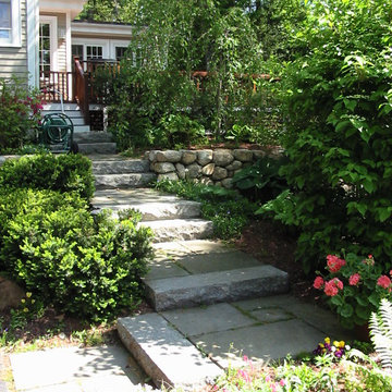 Garden steps to the new deck and sunroom.