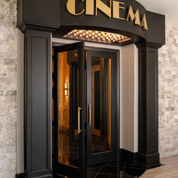 Dramatic Home Theater Entrance with Marquee Lighting