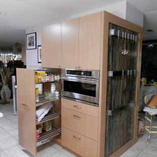 Modern kitchen pantry inspiration - Kitchen pantry - modern ceramic floor kitchen pantry idea in Las Vegas with flat-panel cabinets and light wood cabinets