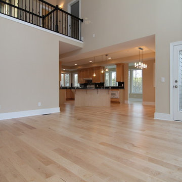 Two story living room open to the kitchen