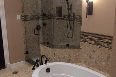 Inspiration for a contemporary gray tile ceramic tile bathroom remodel in Houston with raised-panel cabinets, white cabinets, gray walls and an undermount sink
