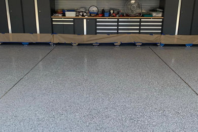 Garage - mid-sized traditional attached three-car garage idea in Salt Lake City
