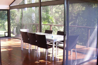 Inspiration for a modern dining room in Sunshine Coast.