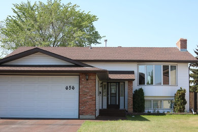 Example of an exterior home design in Edmonton