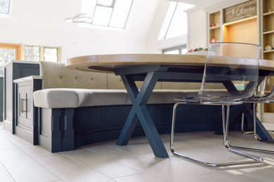This is an example of an expansive traditional dining room in West Midlands.