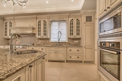 Elegant kitchen photo in Toronto